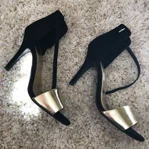 Black and Gold heels worn only a couple times .